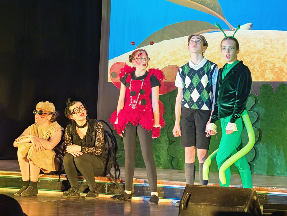 L to R: Danica Neff as Earthworm, Ella Sissons as Spider, Clara Lightbody as Ladybug, Meghan Good as James and Emma Hoplins as Grasshopper