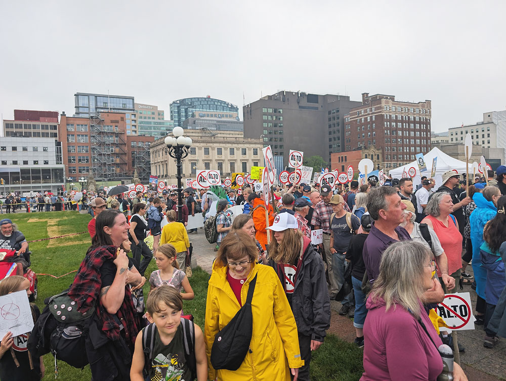 Marching from the Alexandria Bridge protesters filled in Centre Block in front of Parliament.