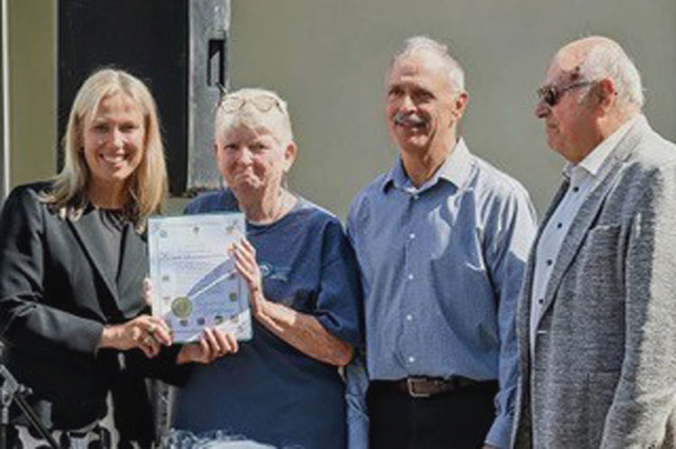 LOLCS Chair of the Board, Mary Kelly accepting a 50th years certificate from MP Shelly Kramp-Neuman, with Reeve Tony Fritsch from Addington Highlands Township and Mayor Gary Litchy from North Frontenac Township
