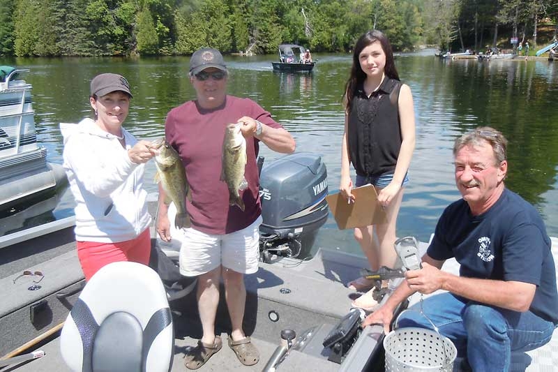 Bass derby goers weigh in at the Double S Marina in Ompah
