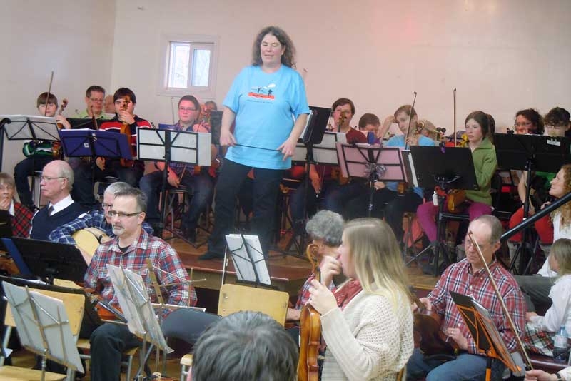 Fiddlin' in the New Year at a very big “Little Christmas” concert