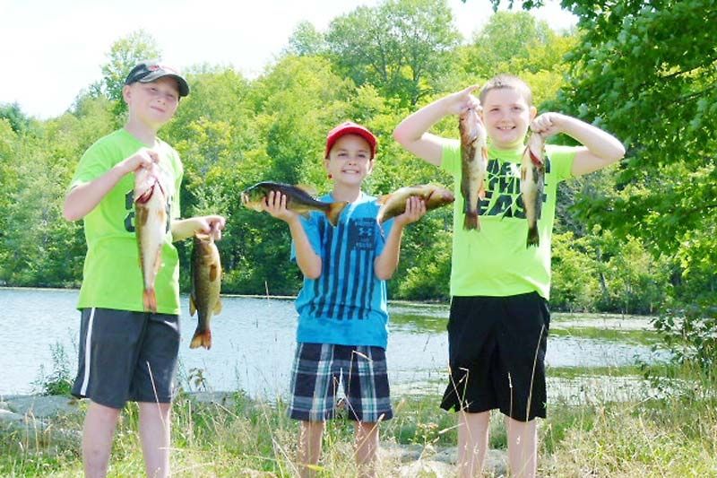 COFA fishing day with local kids teaches angling skills