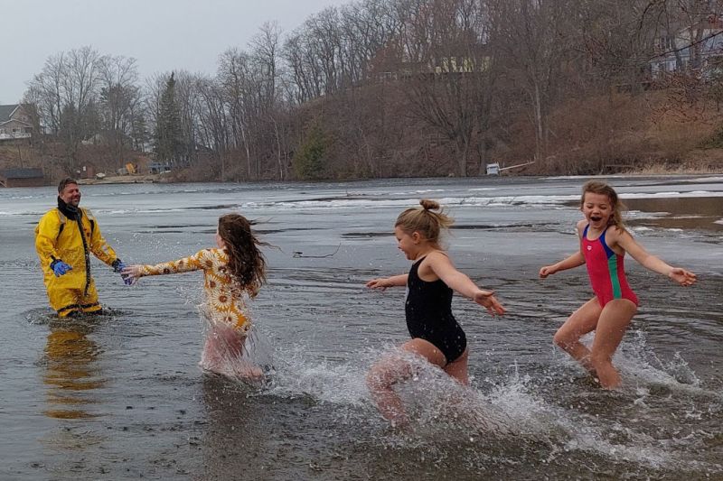 Swimmers Raise Funds & Goose Bumps for Good Causes