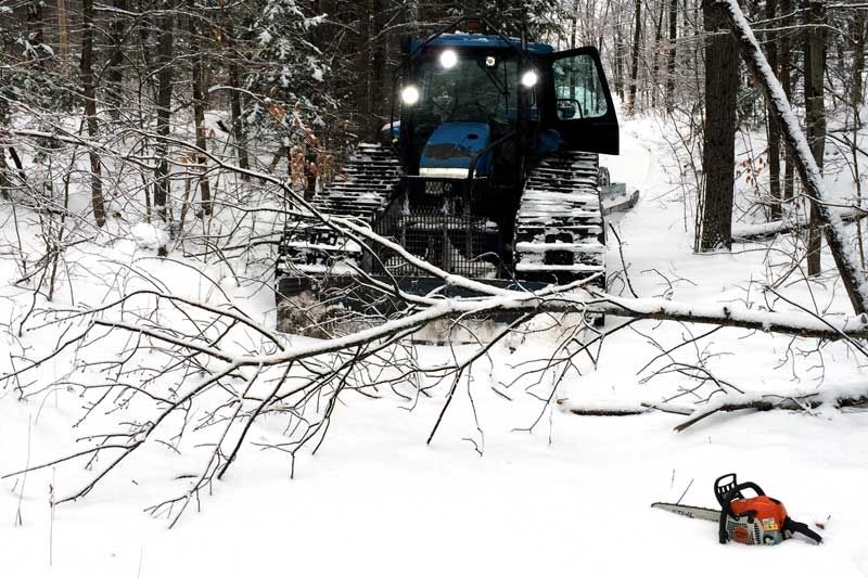 Snowmobile trails still closed but clubs are hard at work grooming