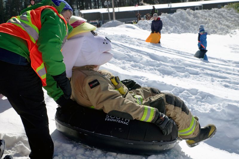  Sparky prepares to tube down the hill. 