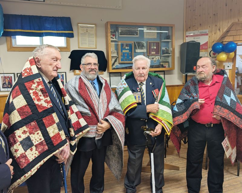 (L to R) Quilts of Valour recipients (L to R) Lloyd Arnold, Claude Gagner, Verne Crawford  and Dave Walen
