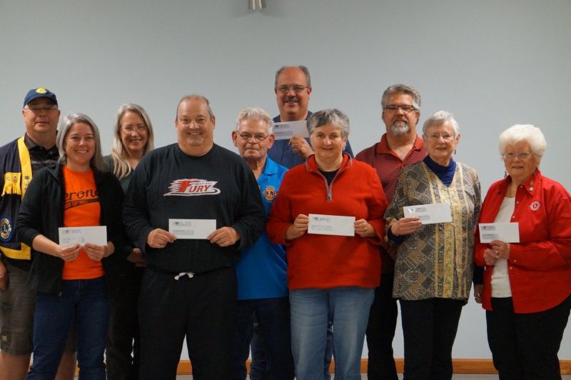 Verona Lions dole out over $15K in car show profits