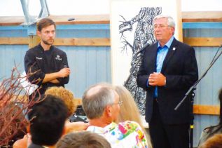 Photo: Mike McKenzie of Seed to Sausage with Habitat for Humanity Chair Ron Darling