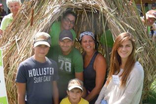 The Delves family inside Cameron's Bog at the Verona Cattail Festival