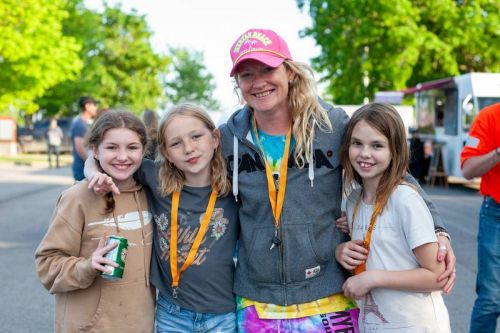 Despite the rainy weather earlier in the day, residents flocked to the Summer Kickoff Festival in Har- rowmiths Centennial Park on Saturday, May 25.