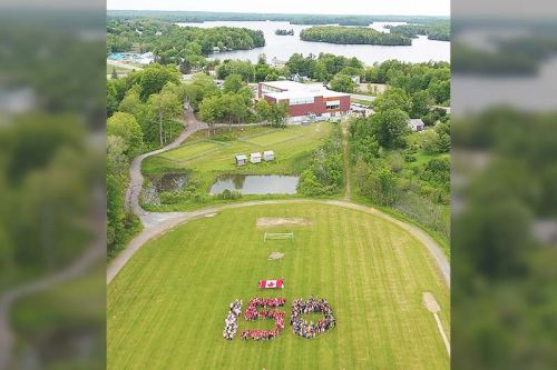 The GREC student body assembled on the soccer pitch for this 150th shot from the school’s drone. The 7 ½ ft. X 12’ Canadian Flag in the background came courtesy of student Claudia Thompson’s grandfather Stephen McCullough. “It’s from the Peace Tower,” she said. “He ordered it 12 years ago and he just got it.” Photo/courtesy of the GREC drone photography program.