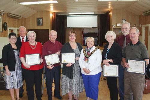 Coun. Cindy Kelsey, Coun. Tom Dewey, Ronda Noble, John Purdon, Gord Struthers daughter Sherry, Mayor Frances Smith, Diane Lake, Coun. Bill MacDonald and Alvin Lake at the Seniors of the Year awards ceremony at Oso Hall in Sharbot Lake Tuesday afternoon. Photo/Craig Bakay