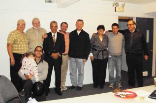 front, kneeling Yousef Al Sarras; back l-r: Pastor Scott, Elton Thompson, Rev. Atef Sedhom Kalaf, Paul Gosse, Pastor Rob, Lourice Abu Awad, Pastor Thomas, Nabil Al Sarras.