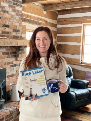 Dorene Hookey shows off her prizes after winning Photo of the Year honours among the 181 entries received by the Buck Lake Association in its recent photo contest.