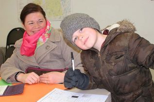 Brigham Waller and mom Heather signed up for softball in Mountain Grove last weekend.