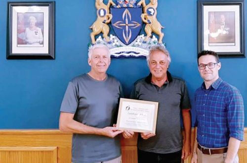 (L to R) Ron Vandewal, Mark Segsworth, and Neil Carbone posed for this picture on the occasion of the township winning an innovation award for a program that provides matching funding for upgrades to private lanes undertaken by local road associations. 