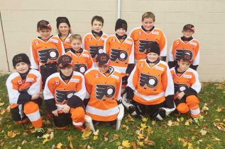 The Frontenac Flyers Novice rep team: Back row l-r- Logan Chiasson, Blake Reid, Jimmy Gibson, Kaleb Baldwin, Nick Quesnel, Braden Dillon, Wesley Jackson. Front row,l-r, Jack Pixley, Graham Melkman, Evan Hollis, Tyson Young, Ryan Edmunds are heading to the All Ontario Novice CC Finals in Fenelon Falls