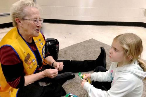 Joanne Ankers and her Granddaughter Allie playing a numbers game at Family Math Night