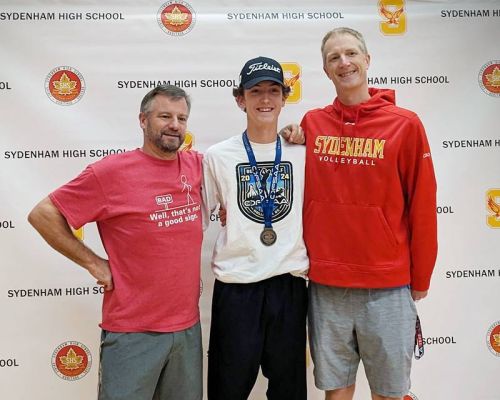 Nathan Van Asseldonk stands with his coach Mike Love and SHS' Athletic Director, Bryan English after he was presented with his OFSAA gold medal.