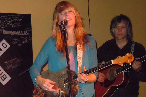 Lisa MacIsaac and Brenley MacEachearn of Madison Violet with bass player Adrian Lawryshyn at the Crossing Pub in Sharbot Lake on April 6