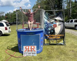 Deputy Mayor John Inglis gets dunked at dunk tank.