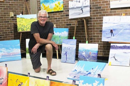 Bill Vanwart with some of his paintings at Cloyne Art & Craft Sale last weekend. Photo/Craig Bakay